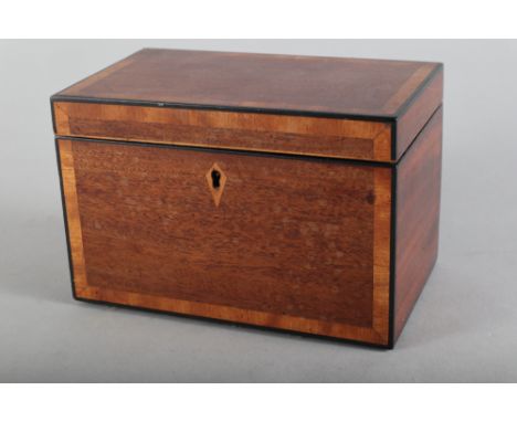 A mahogany and banded rectangular tea caddy, 7" wide x 4 1/2" high, and a turned hardwood coffee grinder 