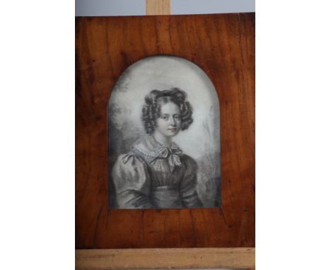 A Victorian monochrome watercolour, half length portrait of a woman, 6 1/2" x 4 1/2", in arch top walnut frame 