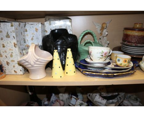 A Sylvac butter dish, a matching pot and cover, a Crown Ducal ceramic basket, a Swineside vase, in the form of a leather jack