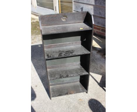 A dark stained oak open three-shelf bookcase, 29" wide, a similar narrow bookcase, 17" wide, and two light oak bookcases 