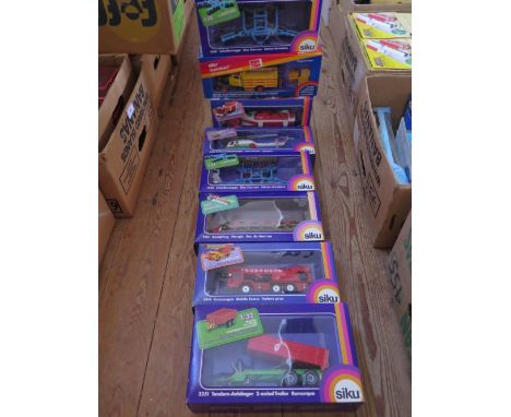 Box of 8 Siku Die Cast Vehicles and tractor machinery