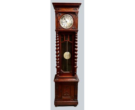 Standuhr, um 1920 Eiche, nussbaumdunkel gebeizt, gedrehte Säulen auf den vorderen Ecken, Gewichte fehlen, 220 x 55 x 35 cm  G