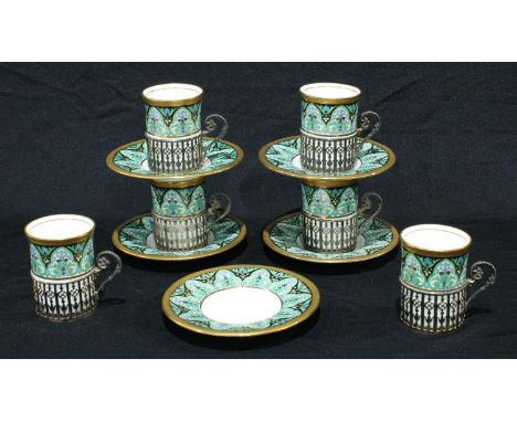 A part set of six silver mounted Wedgewood cabinet coffee cups and stands, five saucers, painted in the Moorish taste picked 