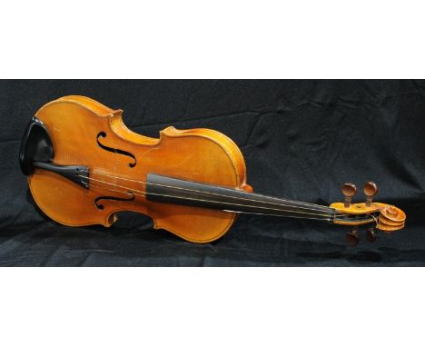 A violin, the two-piece back 35.5cm long excluding button, outlined throughout with purfling, 61cm long 