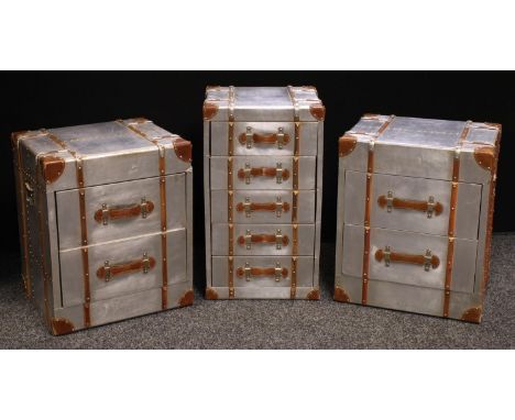 A pair of contemporary bedside cabinets, overlaid with foil, rectangular top above two short drawers, 60cm high, 50cm wide, 4
