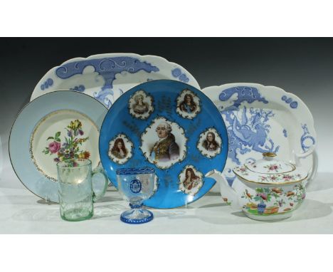 A late 19th century continental Sevres style dish, the centre decorated with Louis XVI and other profiles including Marie Ant