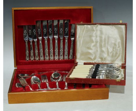 A silver plated King's pattern set of flatware for six, in a canteen, 39cm wide; a set of fish knives and forks for six, boxe