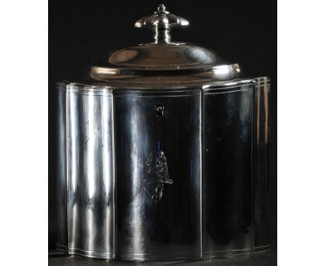A George III silver commode shaped tea caddy, hinged domed cover with fluted knop finial, outlined throughout with wriggle-wo