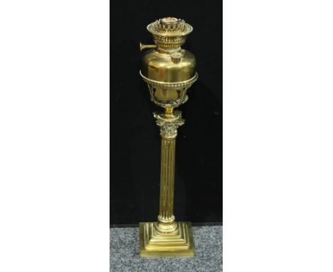 A 19th century brass Corinthian column oil lamp, L&amp;B French reservoir and burner, 64cm high overall 