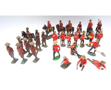 RCMP figures in solid metal, 65 to 75mm scale many recast or copying composition figures, seven mounted, including one by Spi