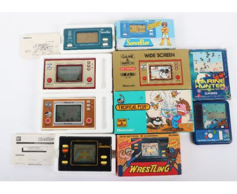 Vintage 1980s Nintendo and Bandai boxed handheld games, including, game &amp; watch ,TF-104 Tropical fish, OC-22 Octopus, bot