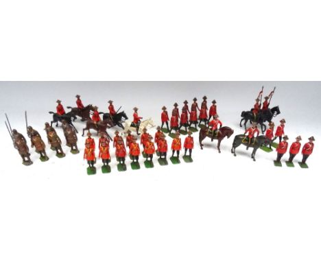 The full range of Britains Mounties, set 214 North West Mounted Police, winter dress, at the slope (Condition Good-Fair, not 