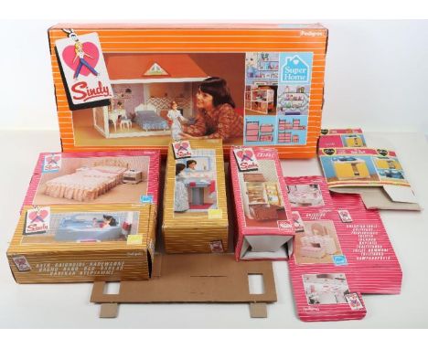 A Sindy Pedigree Doll, Barbie Buggy, parts missing, Sindy boxed wash basin, bath, Toilet, unboxed wardrobe, 5 dolls,  plus ni