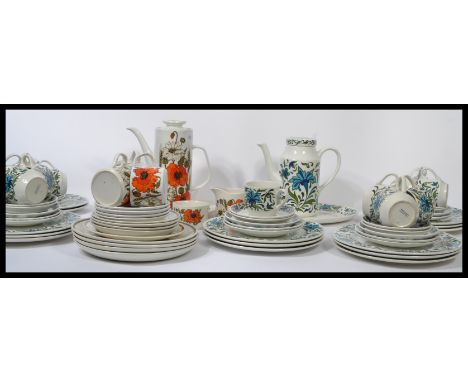 Two retro 20th century ceramic dinner services a Midwinter extensive blue floral retro pattern dinner service and a meakin Po