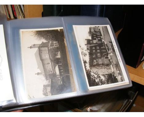 An album of vintage Isle of Wight postcards, together with a bundle of loose postcards