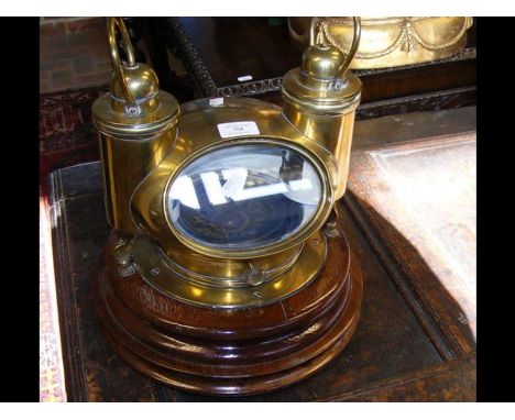 An antique gimbled compass on wooden mount - 34cms highCONDITION REPORTWe have attached a number of additional images to show