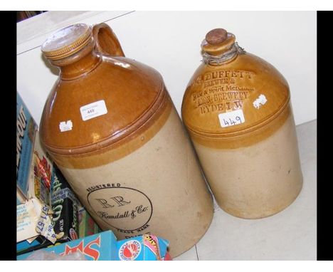 Two stoneware ginger beer bottles, bearing the names R R Randall &amp; Co., Ryde, Isle of Wight and J G Duffett, Ryde, Isle o