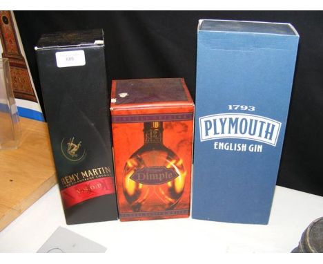 A boxed Dimple Scotch Whiskey, together with Remy Martin and Plymouth Gin