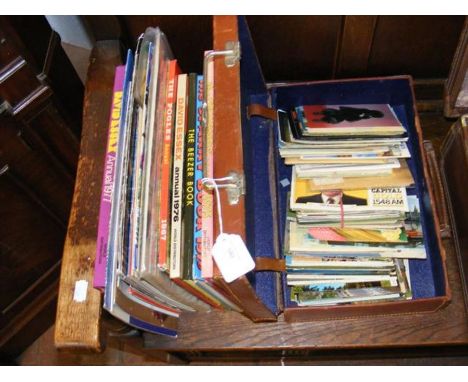 A quantity of vintage annuals, programmes and postcards, including a signed photograph of Herman's Hermits 