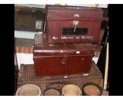 Three vintage metal trunks
