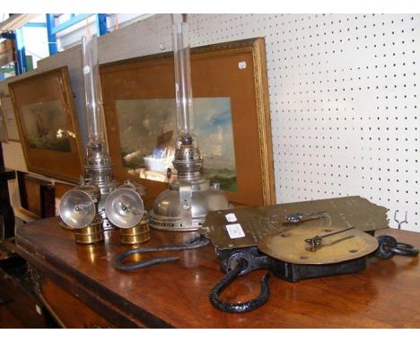 A pair of oil lamps, old scales 