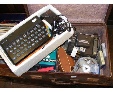 A Sinclair ZX Spectrum, together with assorted vintage video and photographic equipment 