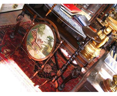 An oak fire screen together with a mahogany torchere stand