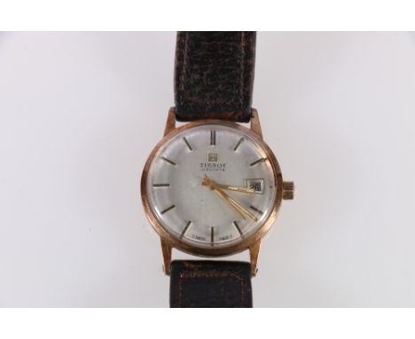 Tissot 9ct gold gents wrist watch with date aperture, leather strap. CONDITION REPORT: The watch does not appear to work. War