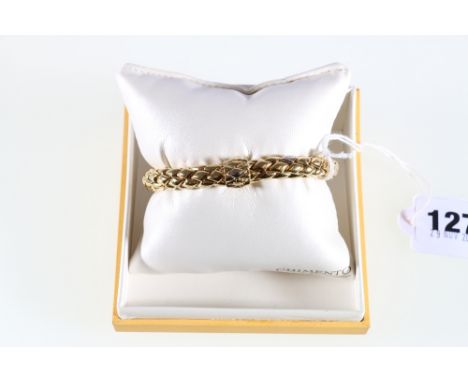 18ct yellow gold 'Chimento' diamond set polished circular bangle. 31.42grms.