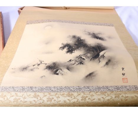 Chinese 20th Century scroll painting of houses in a landscape scene, signed and seal mark, bone ends to the scroll, boxed, 70