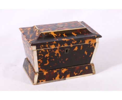 19th Century tortoiseshell tea caddy, the top of sarcophagus form with twin division interior. 