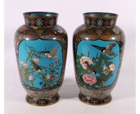 Pair of 19th Century cloisonne high shouldered vases decorated with panels of birds amongst flowers reserved on a diaper phoe