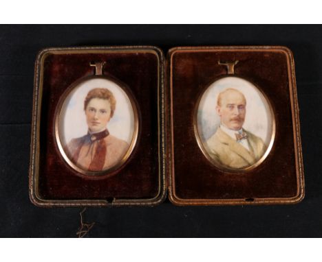Pair of portrait miniatures by V MinprissOval on ivorySigned lower right 1928 & 19308cm and 6.5cmeach in leather case by Jarr