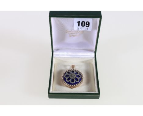 15ct yellow gold diamond, seed pearl and blue enamel  circular locket. 32.00grms. CONDITION REPORT: Age is unknown, Diamond w