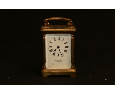 Mappin and Webb Ltd of London French made carriage clock, 11cm tall.