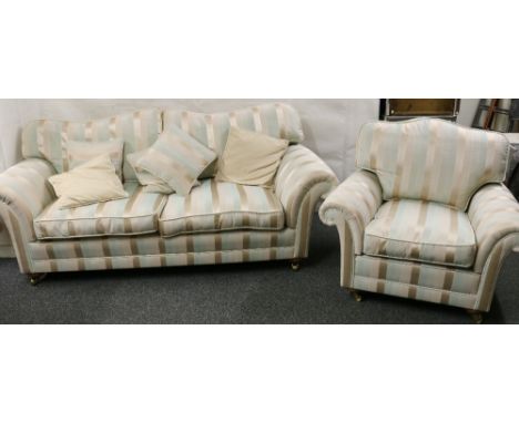 Striped modern sofa and matching armchair.