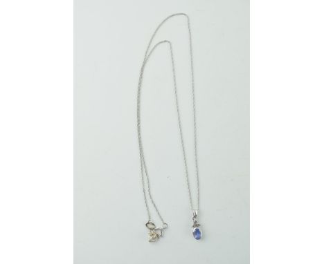 14ct white gold chain with tanzanite pendant, 1.2g.  silver coloured metal added to lengthen chain