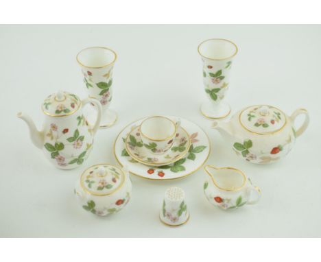 Wedgwood Wild Strawberry miniature tea service to include a teapot, a coffee pot, lidded sugar, milk jug, vases and others (Q