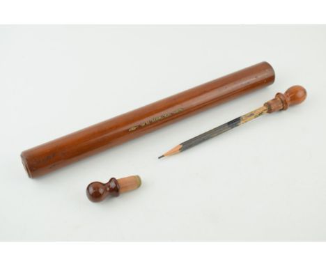 Treen rolling pin cum pencil set, pencil to one end and rubber to the other, 'Wm Mercer', 32.5cm long.