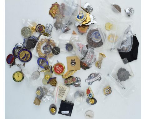A large and mixed collection of enamel pin badges to include vintage and modern examples. Of note a Stoke on Trent Education 