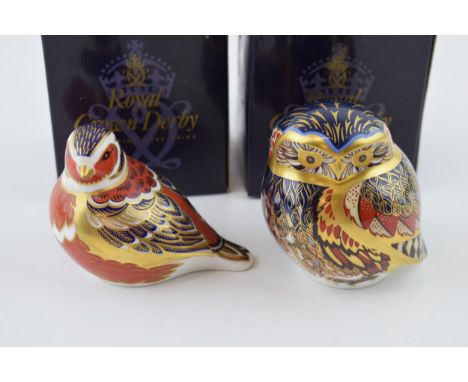 Boxed Royal Crown Derby paperweights to include a Little Owl and a Chaffinch, with gold and silver stoppers (2).