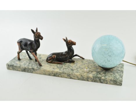 French Art Deco lamp with blue glass globe shade with spelter deer figures mounted to base, untested, 40cm long.