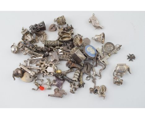 A large collection of silver charms to include animals, tankards and others, 168g.