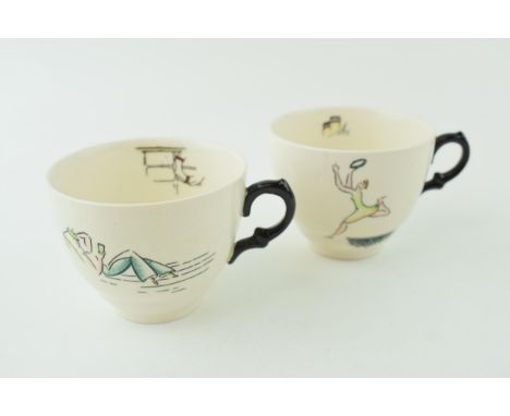 Clarice Cliff pair of Cruiseware cups (2).  In good condition with no obvious damage or restoration.