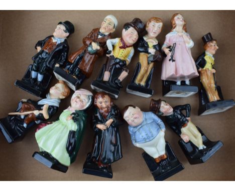 Royal Doulton Dickens figures to include Fat Boy, Jingle, Sam Weller, Bill Sikes and others (11).  In good condition with no 