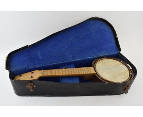 Wooden ukelele / banjo with drum, in vintage leather cased. Unmarked.