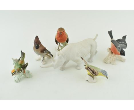 Goebel pottery to include a matte white rhino and five birds (6).  In good condition with no obvious damage or restoration.