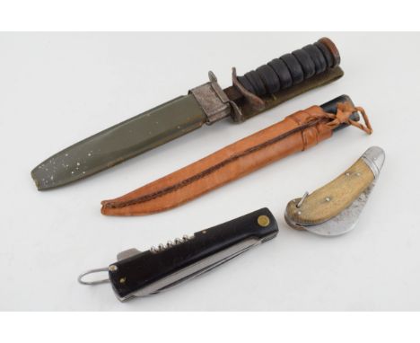 WW2 era US Army M8 B.M. Co fighting knife with a Finnish skinning knife, wooden handle pocket pruning knife and another multi