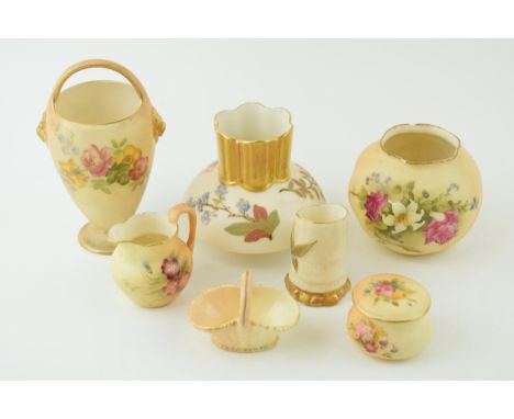 Royal Worcester blush ivory to include a handled vase, a small basket, a low shouldered vase and others, tallest 13cm tall (7