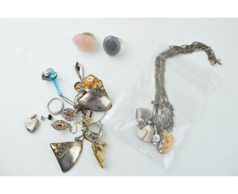 Silver jewellery to include a collection of chains with pendants, together with silver stone set rings and others, circa 114g
